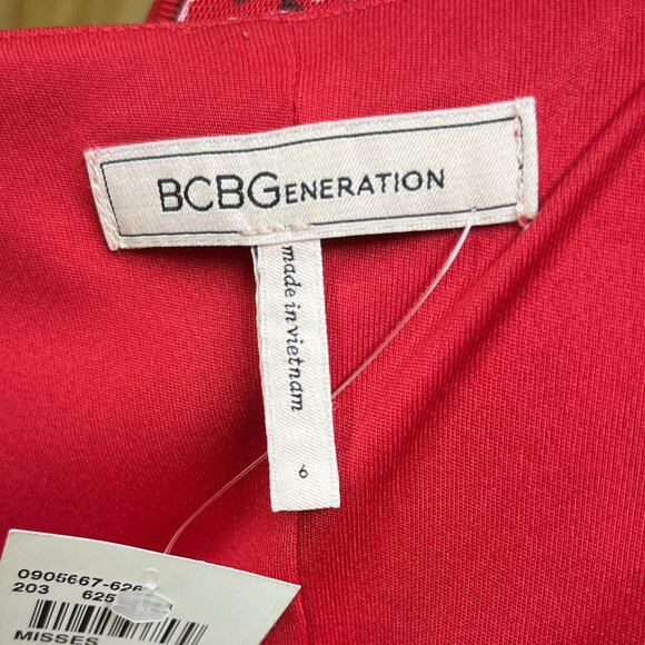 BCBGeneration red print wrap around dress. Shin length. Size 6 sheer sleeves. - Picture 7 of 7